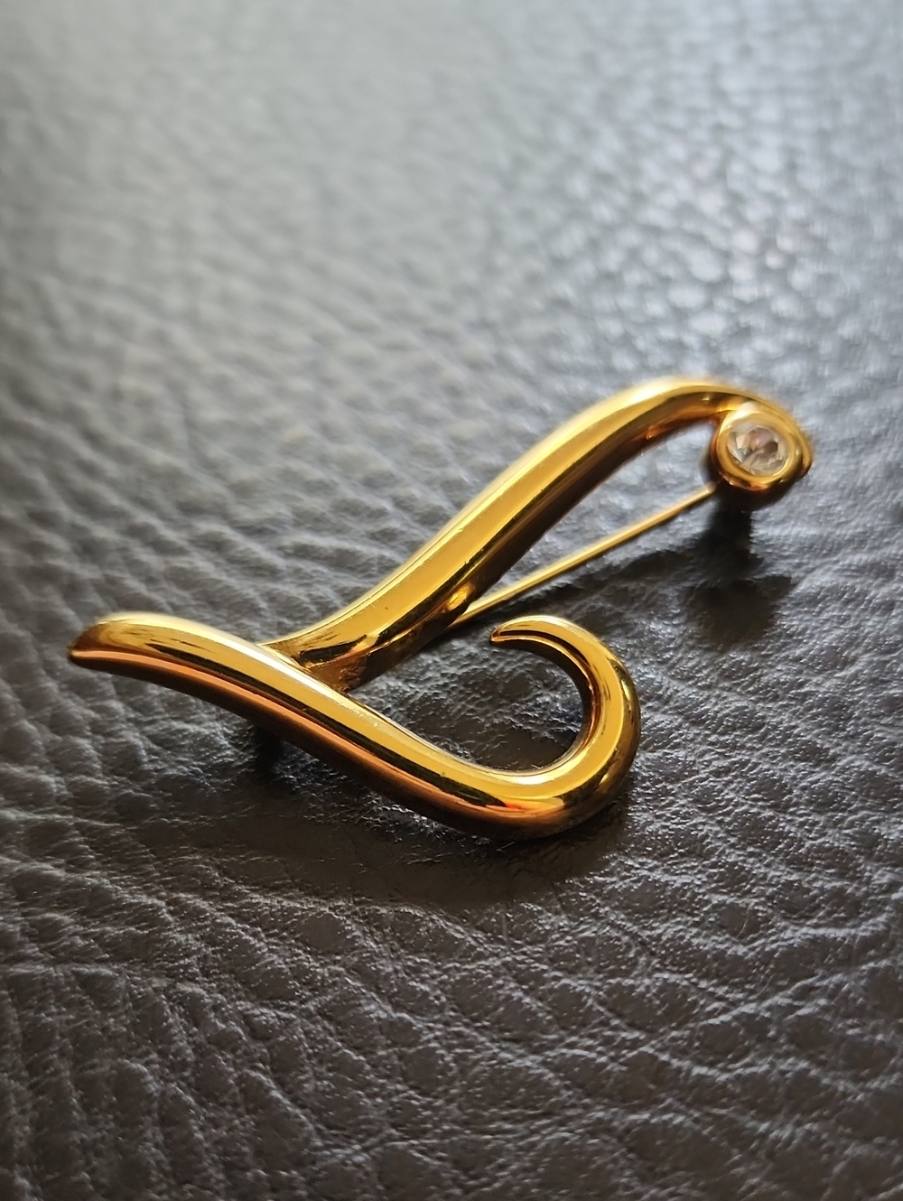 VTG Monet Gold Curved Brooch with Crystal Accent
